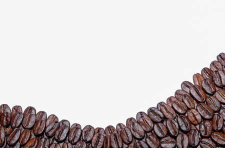 coffee in beans on a white backgroundの写真素材
