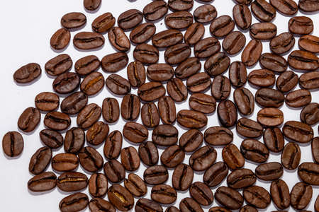 coffee in beans on a white backgroundの写真素材