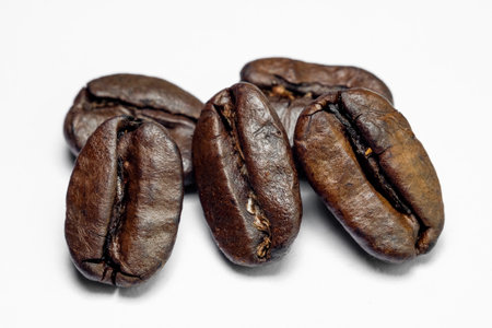 coffee in beans on a white backgroundの写真素材