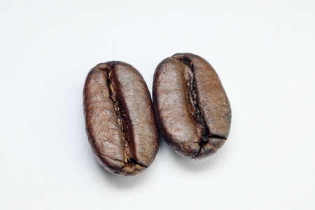 coffee in beans on a white backgroundの写真素材