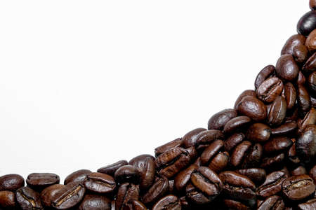 coffee in beans on a white backgroundの写真素材