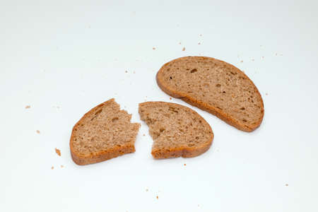 A few pieces of rye bread on a white backgroundの写真素材