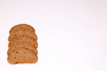 A few pieces of rye bread on a white backgroundの写真素材