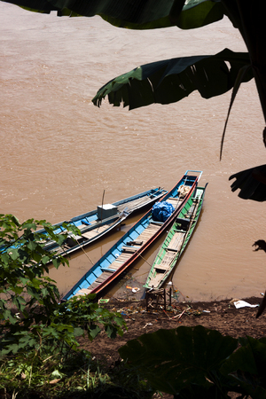 Loatian Mekong Boats moored near Luang Prabang, Laos.の写真素材
