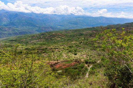 View of the Rio Suarez and pastures on the edge of Barichara, View of the Rio Suarez and pastures on the edge of Barichara, Colombia.の写真素材