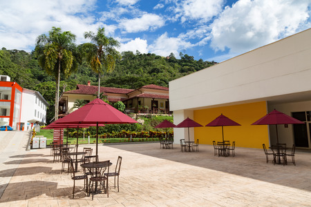 FLORIDABLANCA, COLOMBIA - MAY 3: Chairs and tables at the entrance to the El Santisimo Eco Park in Floridablanca, Colombia on May 3, 2016.のeditorial素材