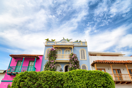 Dramatic clouds over traditional colonial buildings in the Getsemani neighborhood of Cartagena.の写真素材