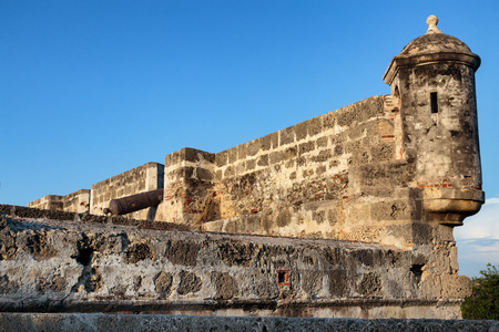 A turret and a cannon on the wall that protected Cartagena, Colomiba in colonial times.の写真素材