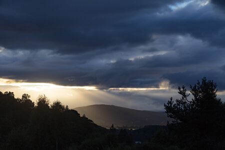 Rays of light during the sunset outside of Perth, Scotland.の写真素材