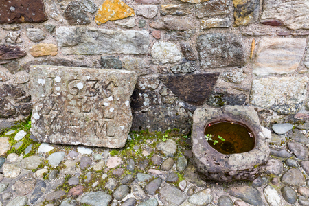 An ancient stone engraving at Castle Campbell near Dollar, Scotland.の写真素材