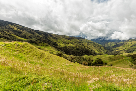 Clouds over pasture land in the mountains outside of Salento, Colombia.の写真素材