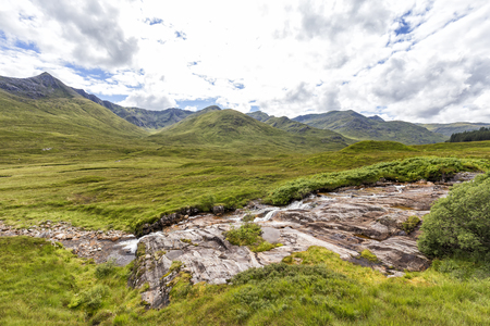 The river Cluanie near the historical site of the Battle of Glen Shiel in Scotland.の写真素材