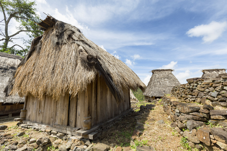 Traditional houses in the Wologai village near Kelimutu in East Nusa Tenggara, Indonesia.の写真素材