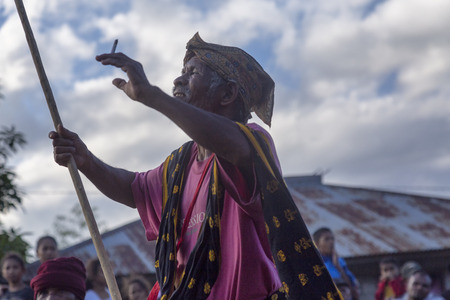 BAJAWA, INDONESIA - MAY 19: An unidentified village elder dances with ceremonial garb near Bajawa in...