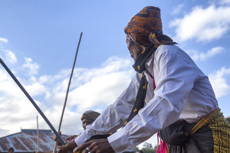 BAJAWA, INDONESIA - MAY 19: An unidentified man dances near  Bajawa in East Nusa Tenggara, Indonesia...