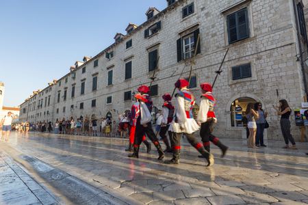 DUBROVNIK, CROATIA - AUGUST 10: Unidentified people watch the changing of the guard in the old city of Dubrovnik, Croatia on August 10, 2016.のeditorial素材