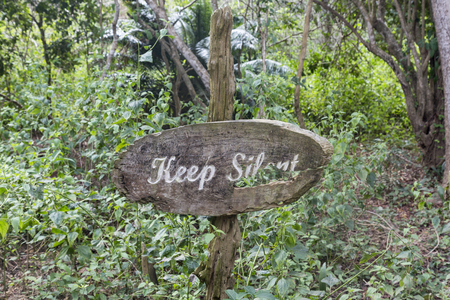 Sign to keep silent on a trail in Komodo Island in Indonesia.の写真素材