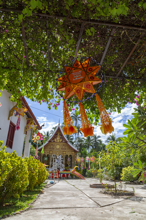 LUANG PRABANG, LAOS - OCTOBER 4: An orange lantern celebrating the end of Buddhist lent at Wat Phaphay on October 4, 2017 in Luang Prabang, Laos.のeditorial素材