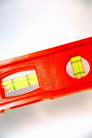  Red level at a slight slant on a white backgroundの写真素材