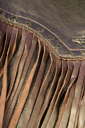 Brown leather fringe on a jacketの写真素材