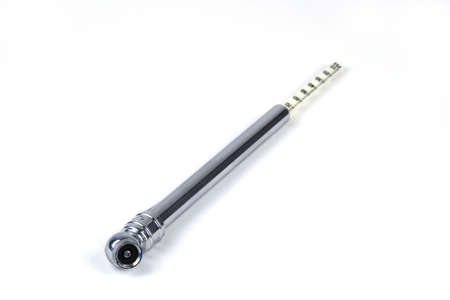 Tire gauge on a white background