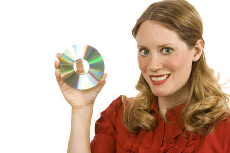 Young woman on white holding a cdの写真素材