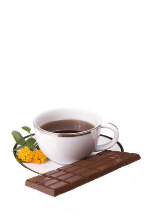 Coffee in white mug on white background with chocolate barの写真素材