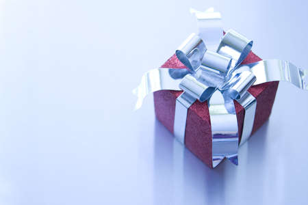 Beautiful Christmas gifts on a silver backgroundの写真素材
