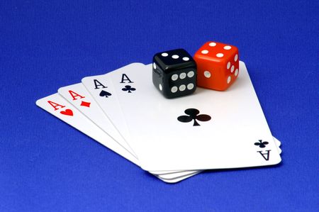4 ace's and 2 dice on a blue backgroundの写真素材