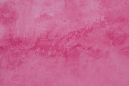 wall texture, scratches and cracks on wall color pink.の写真素材