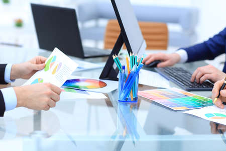 Group of business people busy discussing financial matter during meeting