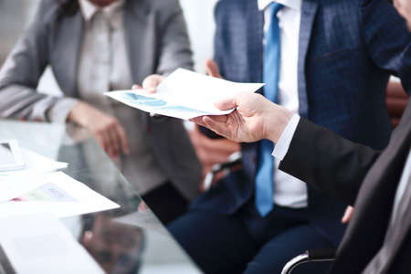 A group of successful businessmen. Discussion of the important contract of the company.の写真素材