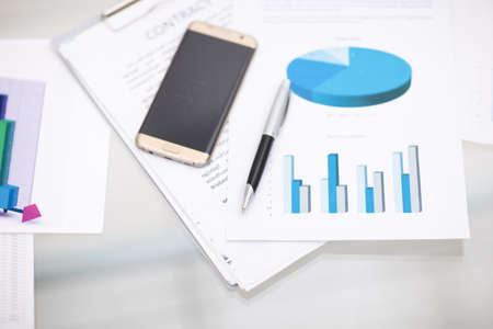 businessman using smart phone in office, hand close upの写真素材