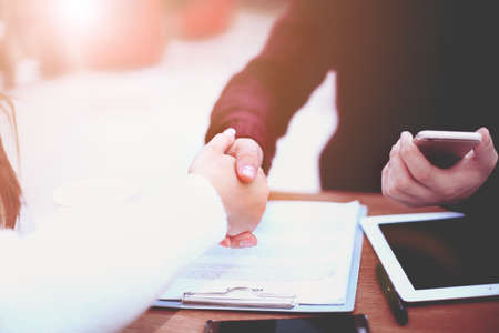 Business handshake and business people.Vintage toneの写真素材