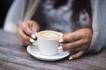 Close up of womens hands holding mobile phone with blank copy space screen for your advertising text...