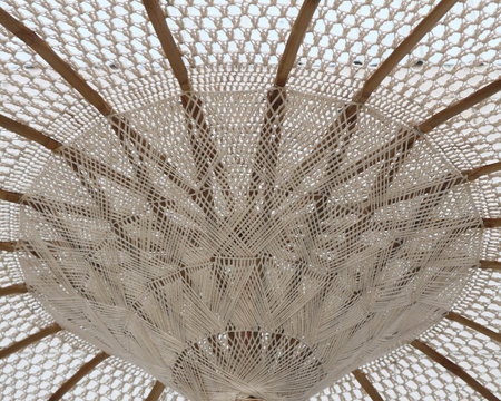 The inside of the white thread umbrella