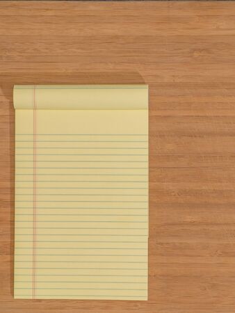 Bamboo Desktop with Yellow Padの写真素材