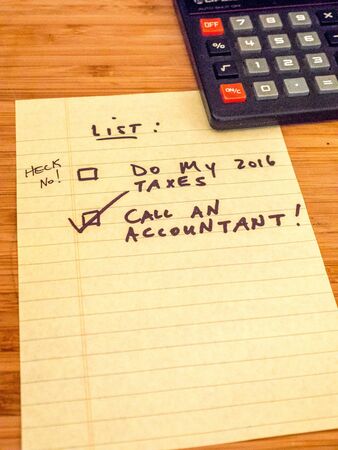 Call an accountant, don't do taxes yourself!の写真素材