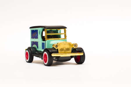 Light blue retro vintage car, toy model isolated on white background. Retro automobileの写真素材