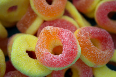 This is a photograph of sour peach candy ringsの写真素材