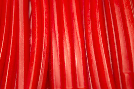 This is a photograph of Strawberry flavored candy sticksの写真素材
