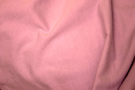 This is a photograph of Light Pink cotton fabric backgroundの写真素材