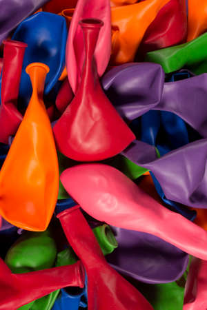 This is a photograph of deflated Helium Balloonsの写真素材