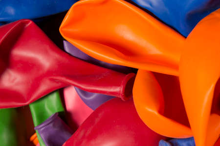 This is a photograph of deflated Helium Balloonsの写真素材