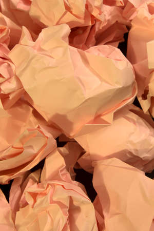 This is a photograph of crumpled textured Pink construction paper backgroundの写真素材