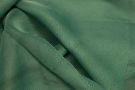 This is a photograph of Green Polyester fabricの写真素材