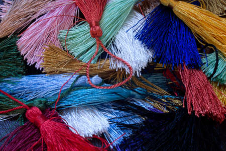 This is a photograph of colorful thread tasslesの写真素材
