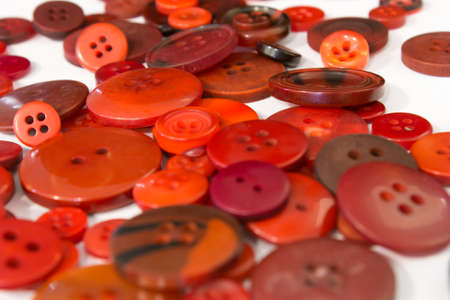 This is a photograph of Brown sewing buttons background