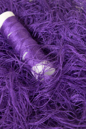 This is a photograph of Neon Purple sewing thread roll backgroundの写真素材