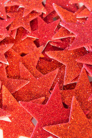 This is a photograph of Red Glitter stars backgroundの写真素材